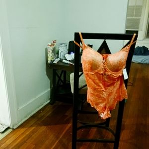 Sexy peach one piece lingerie. Ooh la la.
